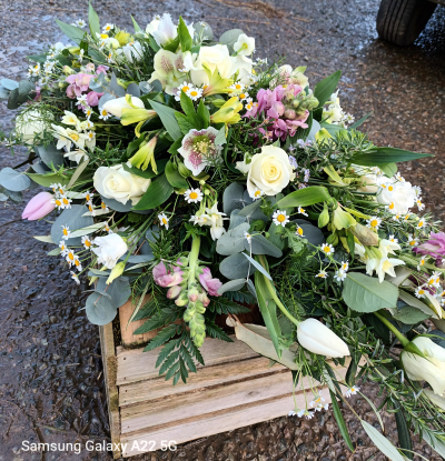 Seasonal coffin spray - A beautiful mix of seasonal flowers in your choice of colours....a teams or a favourite colour perhaps.