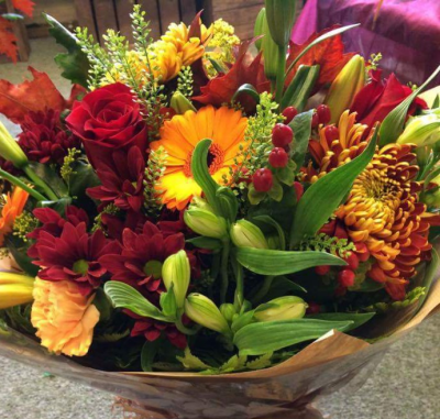 Autumn Breeze - A beautiful bunch of seasonal flowers, wrapped in kraft paper and tied with raffia.